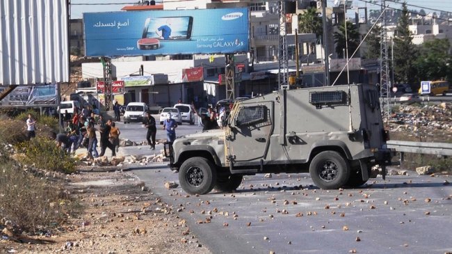 مواجهات بين الطلبة وقوات الاحتلال شرق رام الله مواجهات