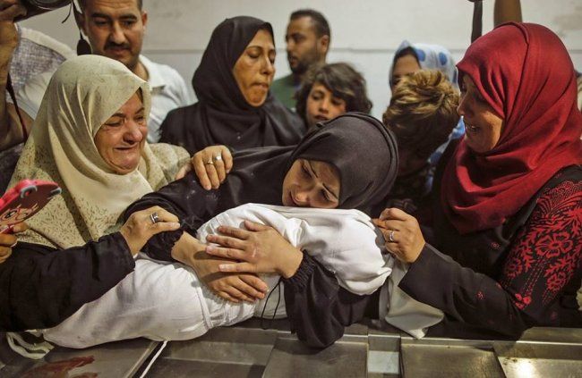 محدث حصيلة..115 شهيداً بينهم 27 طفلاً و11 سيدة ونحو 600 اصابة في العدوان الاسرائيلي على غزة