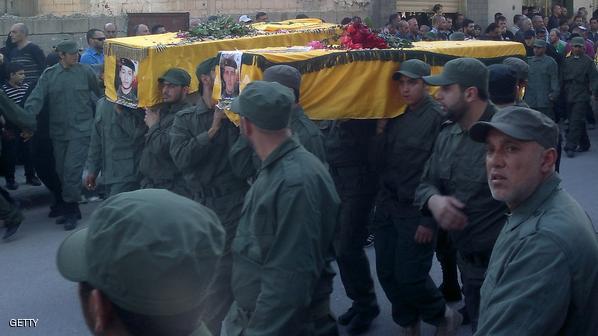 حزب الله في بعلبك أثناء تشييع أحد قتلى الحزب في القصير السورية - أرشيف