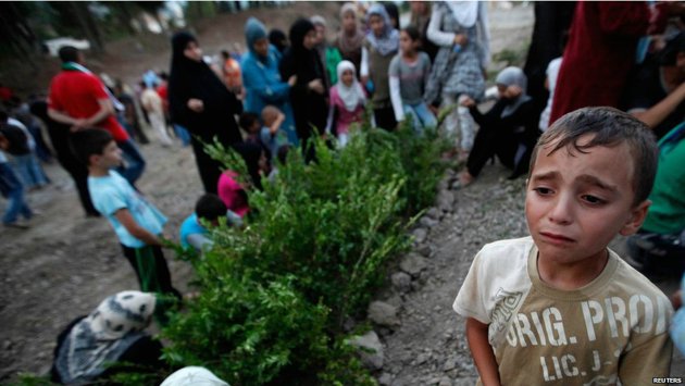 طفل لاجئ في أحد المخيمات