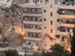 بن غفير يشرف على هدم بناية سكنية في الطور بالقدس وتشريد عشرات الأطفال والنساء