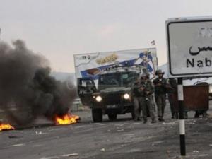 اشتباكات في نابلس ومواجهات واعتقالات بالضفة