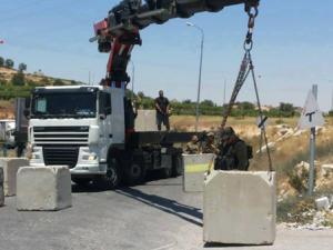 مداخل الرام والعيسوية مغلقة بالإسمنت
