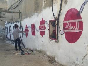 "لما الحيطان تحكي"... رسومات على الجدران تحمل رسائل انسانية