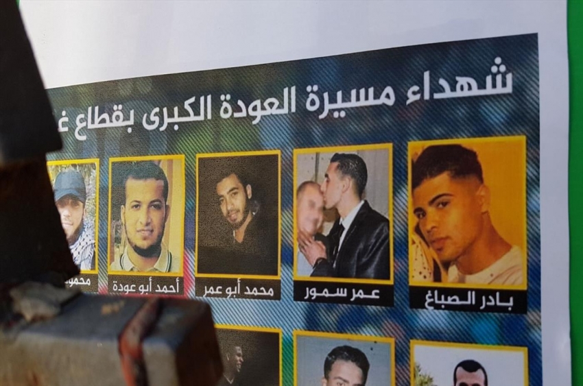 صور "شهداء مسيرة العودة" على أبراج "تل أبيب"