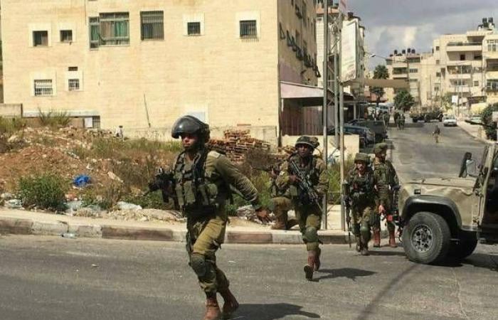الاحتلال يهدم بناية سكنية في البيرة  (شاهد)