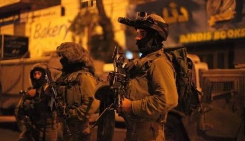 حملة اقتحامات واعتقالات طالت 14 مواطناً