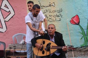 فريق ديرنا الشبابي يطلق مبادرة حارة التسامح في دير البلح‎